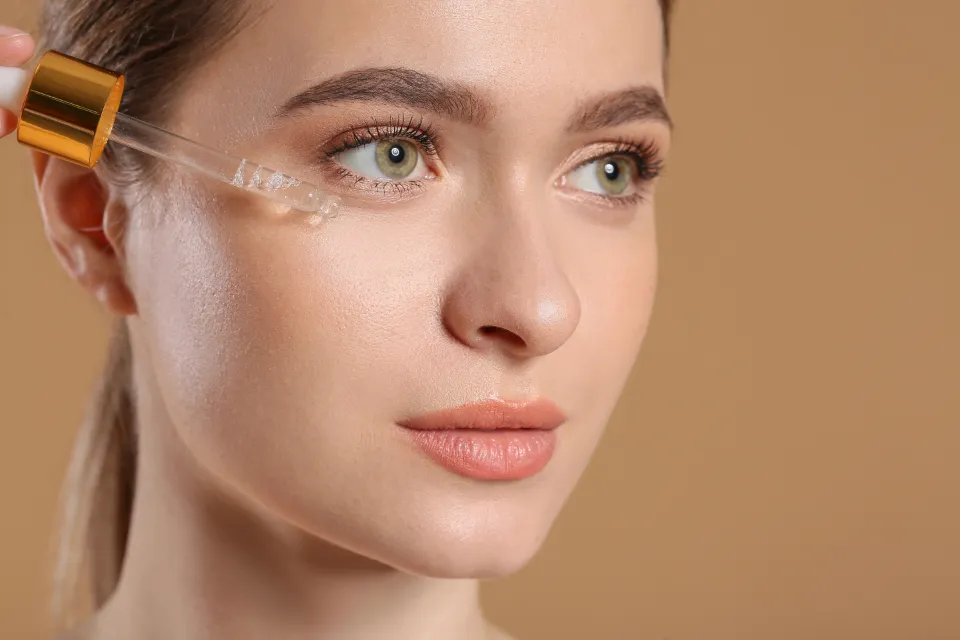 A skincare treatment: serum being applied during a facial