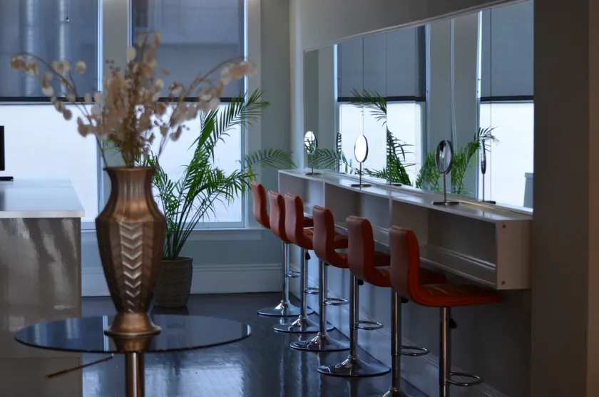 A modern salon interior with styling chairs and mirrors